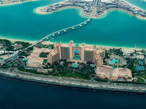 aerial view of a luxury hotel resort on an artificial island in dubai ...