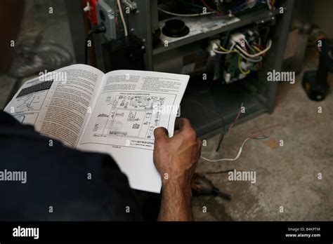 Installation of new high-efficiency gas furnace Stock Photo - Alamy