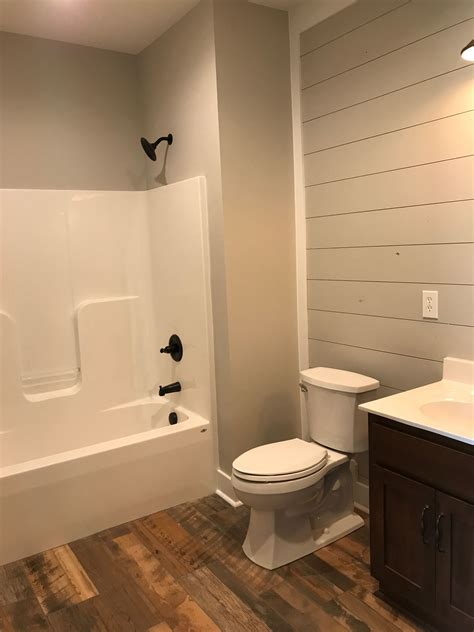 Upstairs bath with shiplap accent wall. Wall color, SW Repose Gray ...