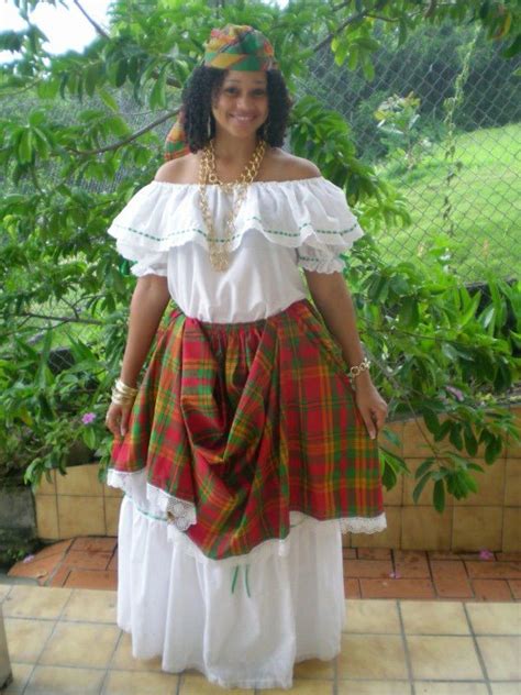 This is called the Creole dress. It is the traditional dress for girls in Dominica, it is a ...