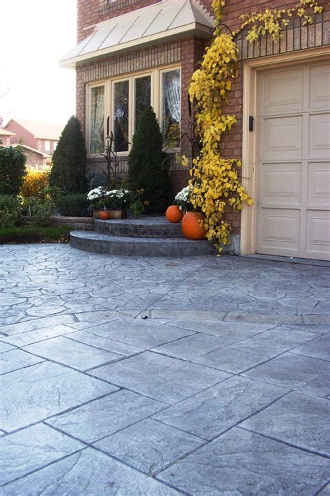 stamped concrete driveway using 2 different patterns Stamped Concrete Driveway, Concrete ...