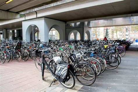 Bike Parking Lot At Amsterdam Editorial Stock Photo - Image of ecofriendly, environmental: 142994143