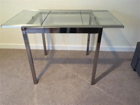 Ikea extendable glass dining table in RH20 Horsham for £50.00 for sale | Shpock