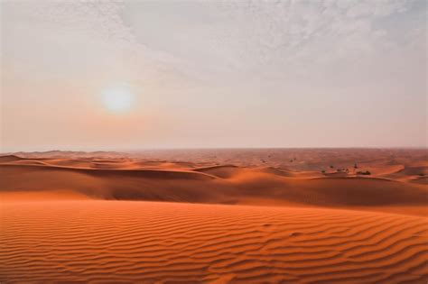 Premium Photo | Sunset in sand dunes of desert of dubai