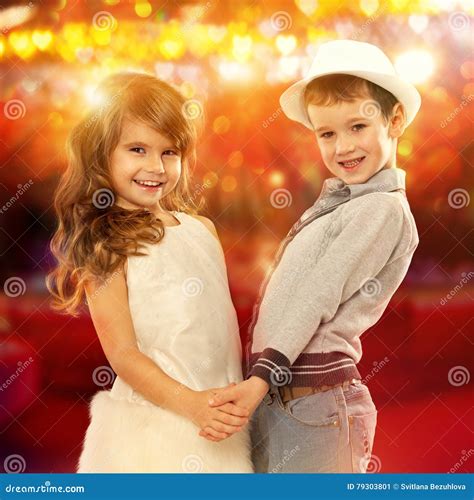 Lovely Little Boy and Girl Holding Hands. Kids Love Stock Image - Image of glance, clothes: 79303801