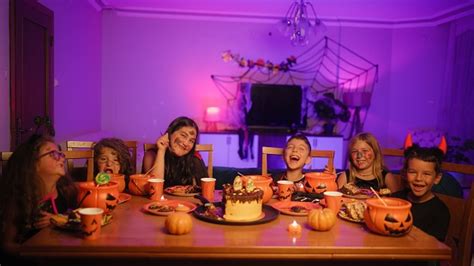 Portrait Of Group Of Children Friends During House Halloween Party At ...