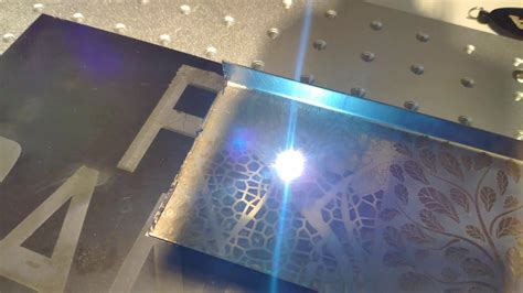 Laser engraving on stainless steel - YouTube