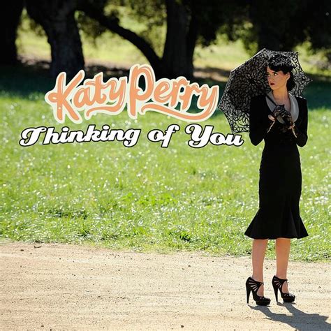 Katy Perry wears a beautiful 1940s black suit with a tuxedo collar and ...