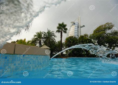 Burj Al Arab and pool editorial photo. Image of stream - 42361556