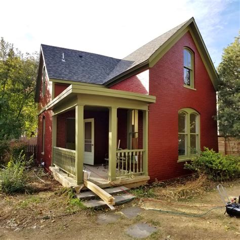 historic_renovation_fort_collins_co_red_brick_house_green_trim - HighCraft