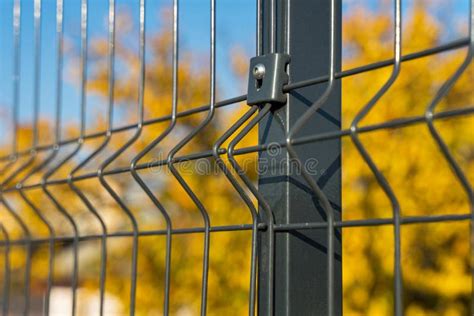 Steel Grating Fence Made with Wire on Blue Sky Background. Sectional ...