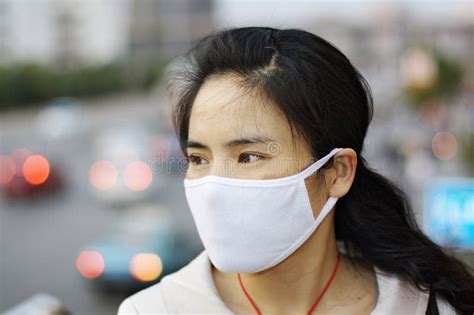 Woman wearing a face mask stock image. Image of h1n1 - 13337245