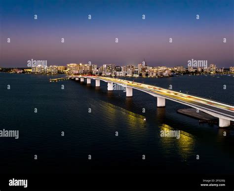 Evening aerial image of the Sarasota, Florida Skyline and Bridge Across ...