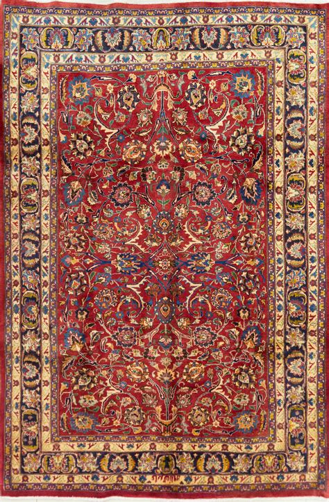 Lot - A Persian Hand Knotted Mashad Carpet, 295 X 200