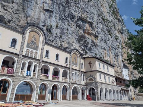 Visiting The Spectacular Ostrog Monastery In Montenegro - Sandal Tan Man