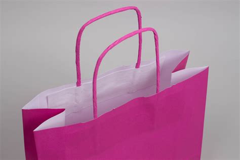 17-1/4 x 6 x 18 Bright Hot Pink Tinted Paper Shopping Bags