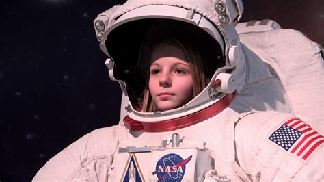 Young female in NASA space suit 4k Stock Video Footage - Storyblocks