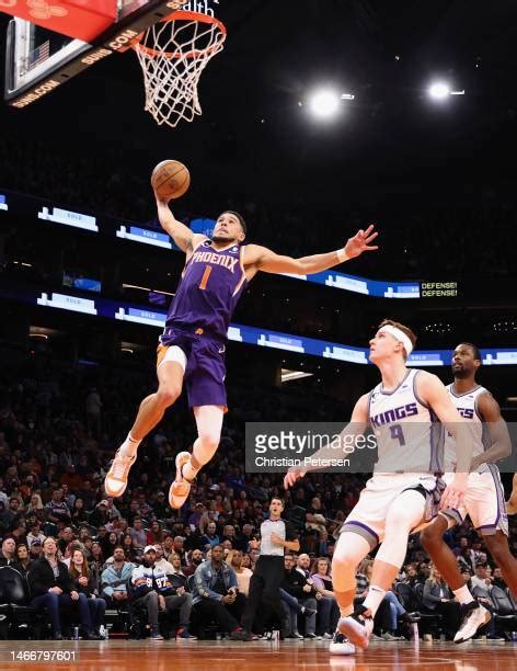 Devin Booker Dunking Photos and Premium High Res Pictures - Getty Images