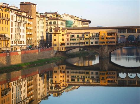 We arrived at sunset and the view was picture perfect. Ponte Vecchio a beautiful Italian Old ...