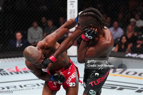 Jalin Turner punches Bobby Green in a lightweight fight during the ...