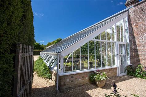 13 Free DIY Greenhouse Plans (By Type of Greenhouse)