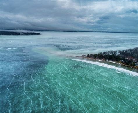 Higgins Lake Blue Ice Break up Photograph by Ron Wiltse - Fine Art America