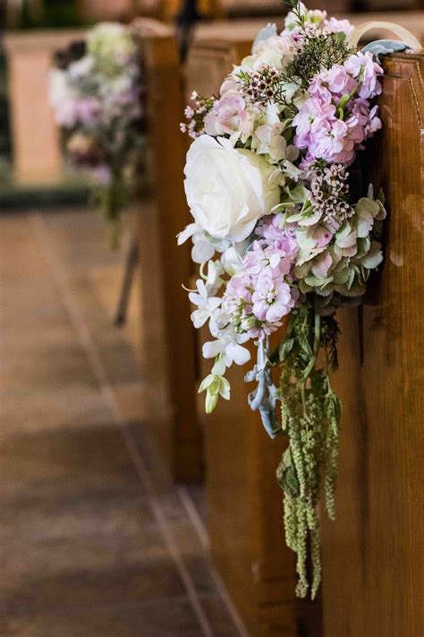 Ceremony Décor Photos - Church Pew Arrangement - Inside Weddings