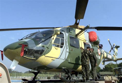 Indian army helicopter makes 'hard landing', one dead | Reuters