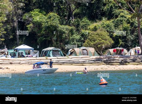 The Basin Campground Pittwater in Ku-ring gai chase national park, a series of campers have ...