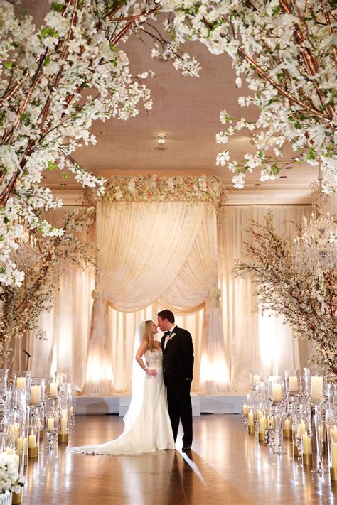 Couple at Elegant Ceremony with Divine Chuppah | Photography: Bob & Dawn Davis Photography. Read ...