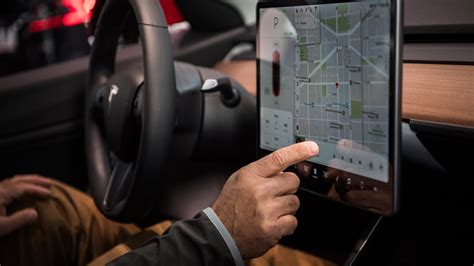 Tesla to stop allowing drivers to play videogames while driving | Mashable