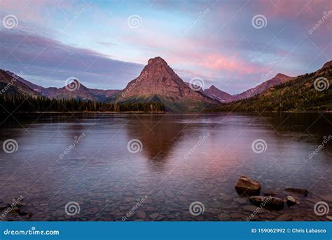 Two Medicine Lake at Sunrise Stock Photo - Image of east, painted: 159062992