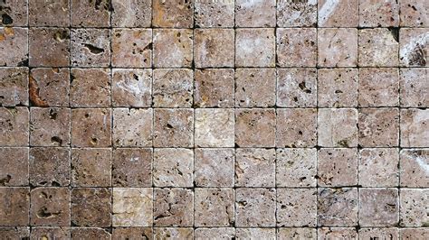 Square stones surface background Seamless Loop. Travertine masonry tiles cladding wall texture ...