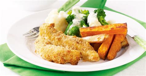 Crumbed fish fingers and vegetable chips