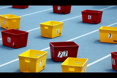 5 6 7 8 | Boxes to hold athletes' warm-up gear sit in the la… | Flickr