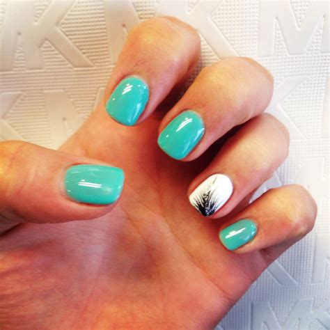 Turquoise gel nails with white and black feather accent. Gel Nails Long, Summer Gel Nails, Cute ...