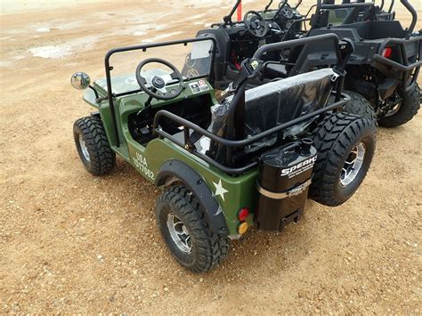 GAS POWERED JEEP THEMED GO CART - J.M. Wood Auction Company, Inc.