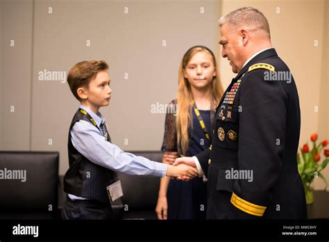 U.S. Army Chief of Staff Gen. Mark A. Milley meets the Army Family of the Year backstage at AUSA ...