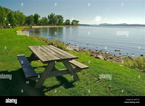 North America, Canada, Quebec, Eastern Townships, Magog. Picnic table and scenery in Pointe ...