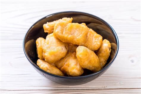 Chicken nuggets with sauce stock image. Image of food - 143107971