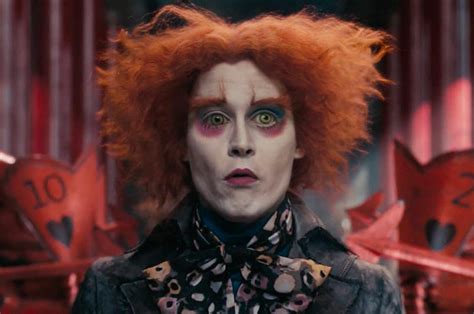 Johnny Depp turns up at Disneyland as 'Alice Through The Looking Glass'' Mad Hatter - watch