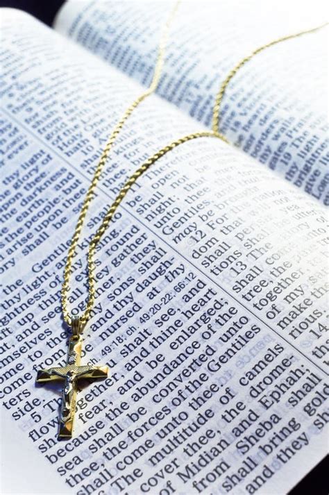 Golden Cross Necklace on an Open Bible Stock Image - Image of christianity, prayer: 29407785