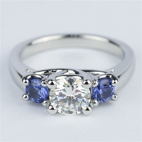 Three Stone Sapphire Engagement Ring And Center Diamond