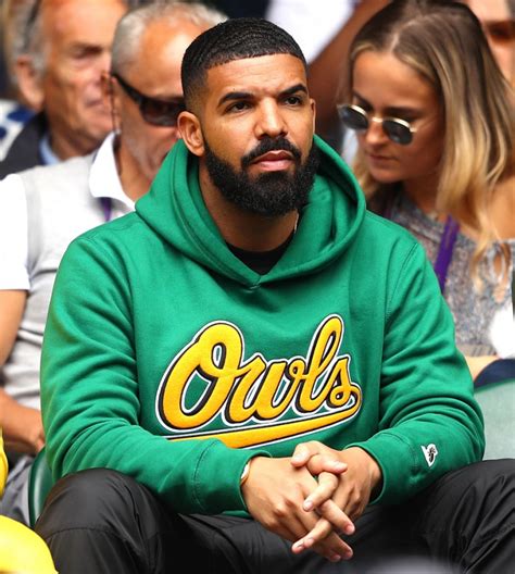 Rapper Drake attends day eight of the Wimbledon Lawn Tennis Championships at All England Lawn ...