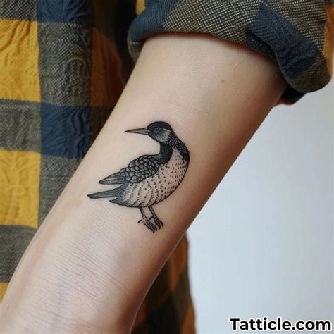 Loon Tattoo Meaning: Uncover its Deep Symbolism and Care Tips - Tatticle