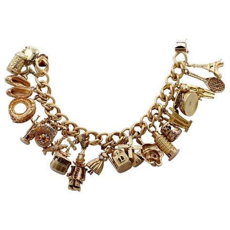 Gold Charm Bracelet with Eleven Charms with Assorted Stones at 1stDibs