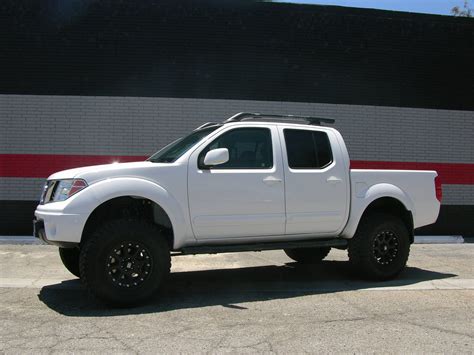 Nissan Frontier equipped with a Fabtech 6" System #fabtech # ...