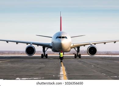 Airport Marshaller Meets Passenger Aircraft That Stock Photo 1026356650 | Shutterstock