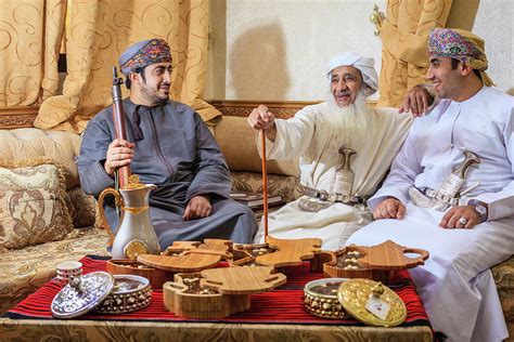 Omani halwa makers Photograph by Alexey Stiop - Fine Art America