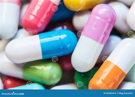 Pills of Different Colors Background Stock Photo - Image of treatment, pharmaceutical: 82283416